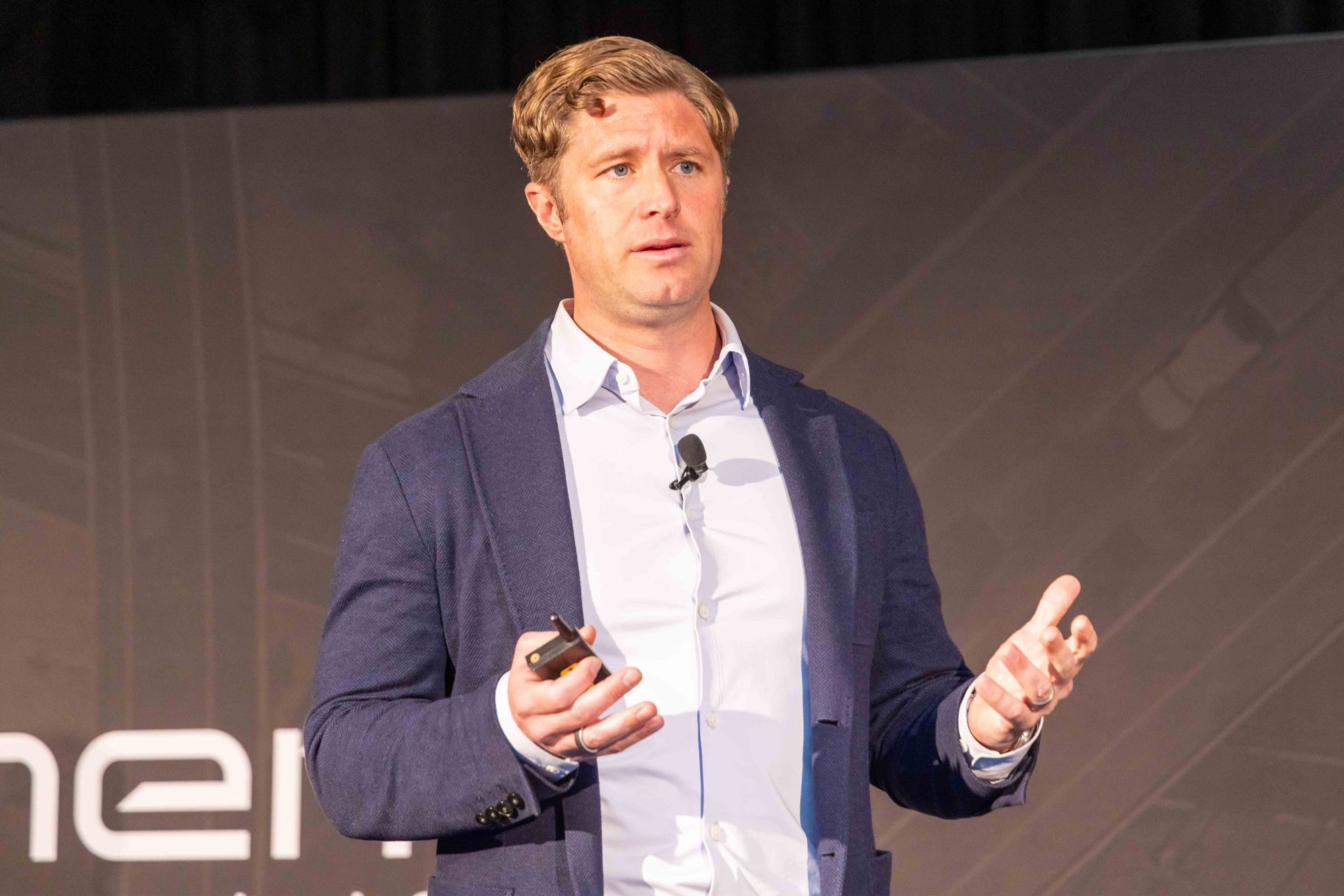 Mark Johnson speaking on stage